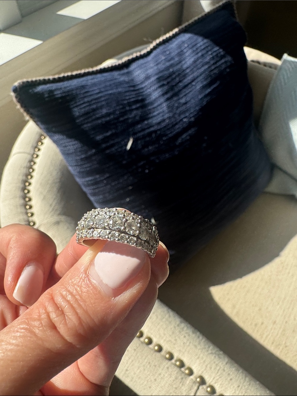 White gold
3 rows of lab created diamonds